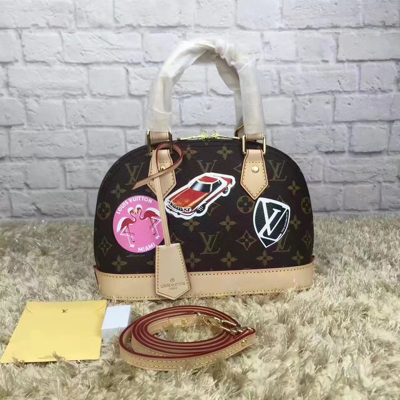 Louis Vuitton M43230 Alma BB World Tour Monogram Canvas