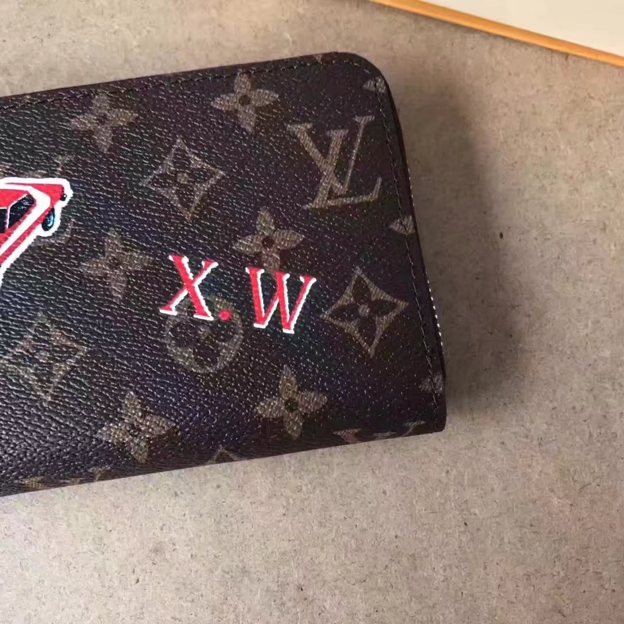 Louis Vuitton M60017 Hotel Stickers Zippy Wallet in Monogram Coated Canvas