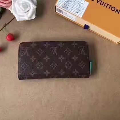 Louis Vuitton M60017 Hotel Stickers Zippy Wallet in Monogram Coated Canvas